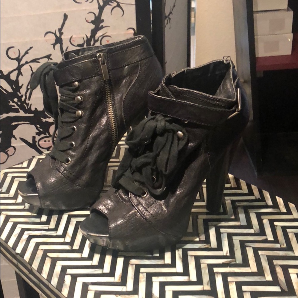 Ankle booties by Aldo